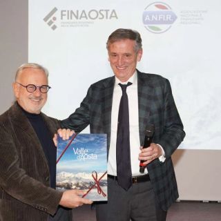 Da sn il presidente di Anfir, Michele Vietti sul palco insieme al presidente di Finaosta, Marco Linty