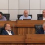 In primo piano da sn il direttore e il presidente di Confcommercio VdA, Adriano Valieri e Graziano Dominidiato