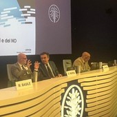 Al centro Giuseppe Marra ed Enrico Grosso al tavolo del dibattito