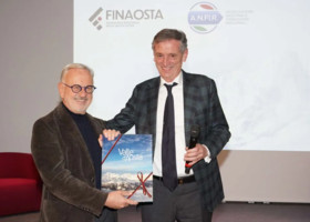 Da sn il presidente di Anfir, Michele Vietti sul palco insieme al presidente di Finaosta, Marco Linty