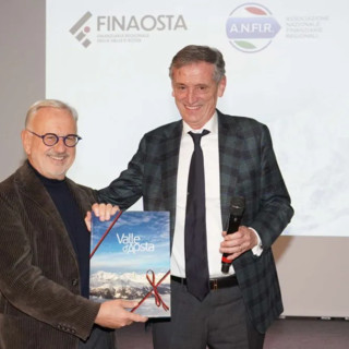 Da sn il presidente di Anfir, Michele Vietti sul palco insieme al presidente di Finaosta, Marco Linty