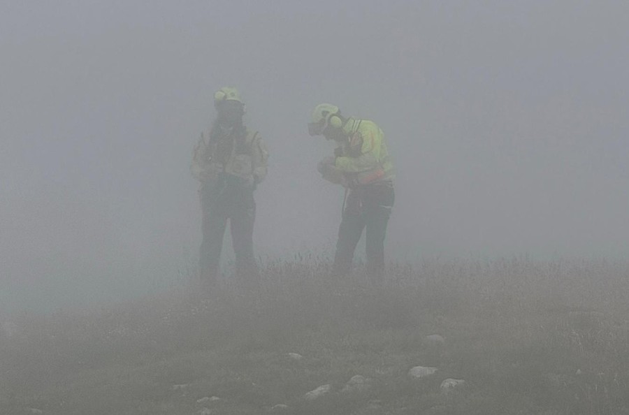Due guide del Sav nella nebbia durante i soccorsi