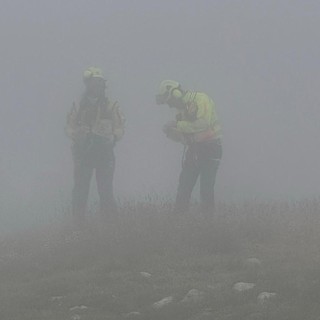 Due guide del Sav nella nebbia durante i soccorsi