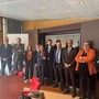 Sabrina Janin (sesta da sn) insieme al team di dirigenti e professionisti di Aosta Factor Spa